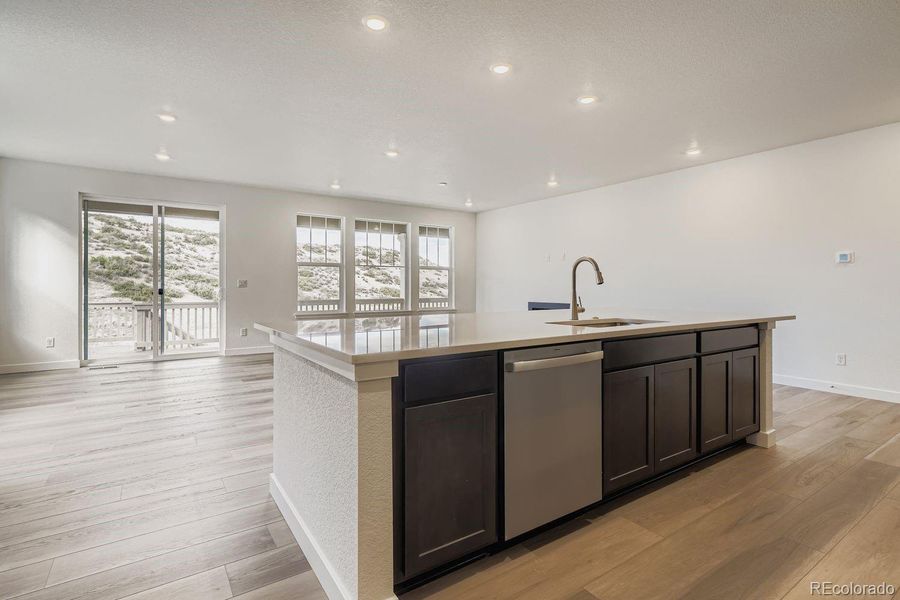 Furnished interior view inside a new home in Macanta: The Grand Collection, Castle Rock (Image 7).