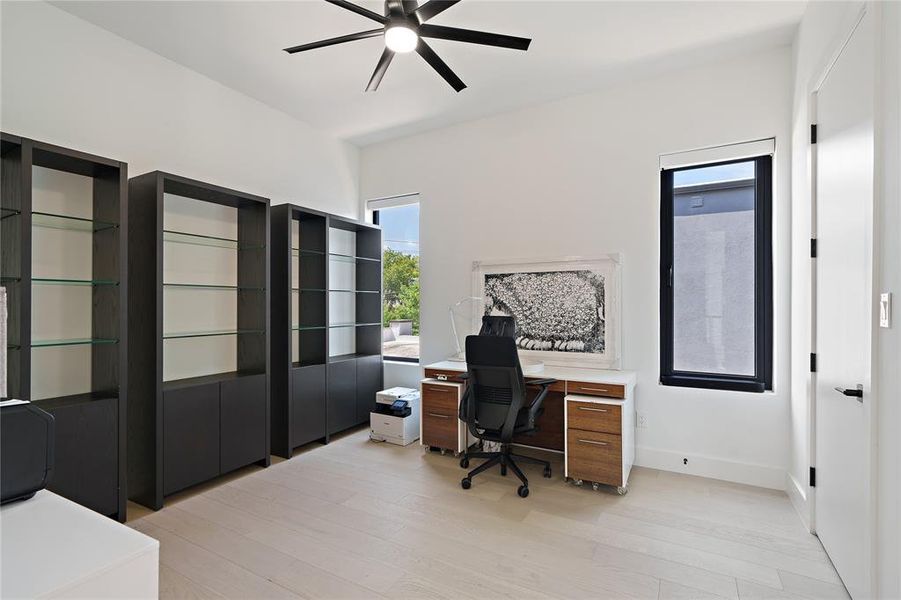 Bedroom 2 with electric, custom black out shades