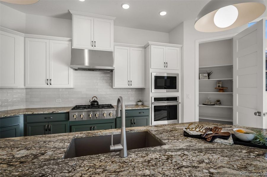 Furnished interior view inside a new home in Cloverleaf - Pinnacle Collection, Monument (Image 27).