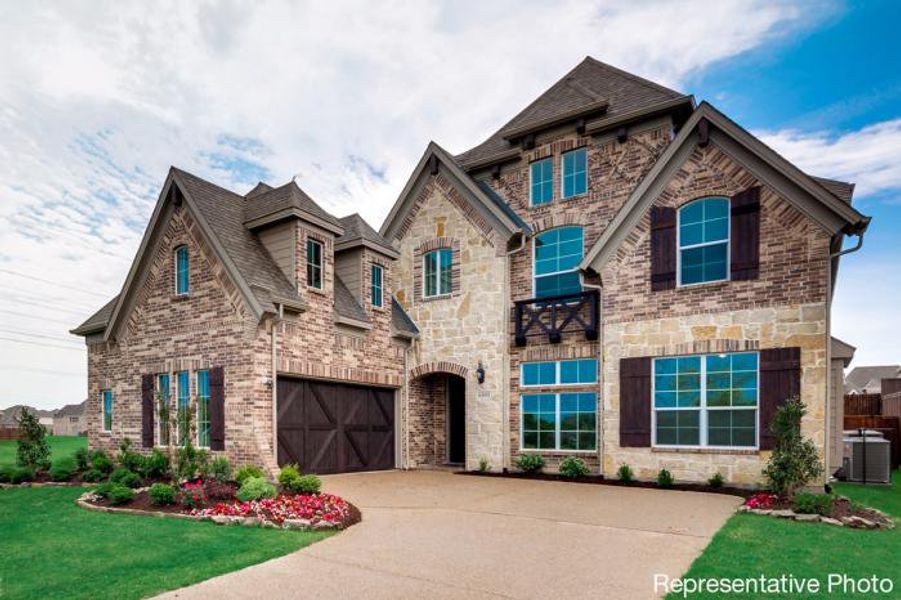 Representative exterior photo of a completed home built from the Hartford by Grand Homes in Creekside at Elevon, Lavon, TX (Image 16).