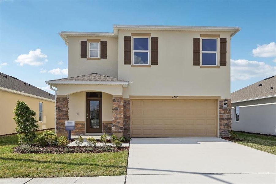 Front exterior of a new home in , Lake Hamilton, FL, highlighting curb appeal (Image 26).