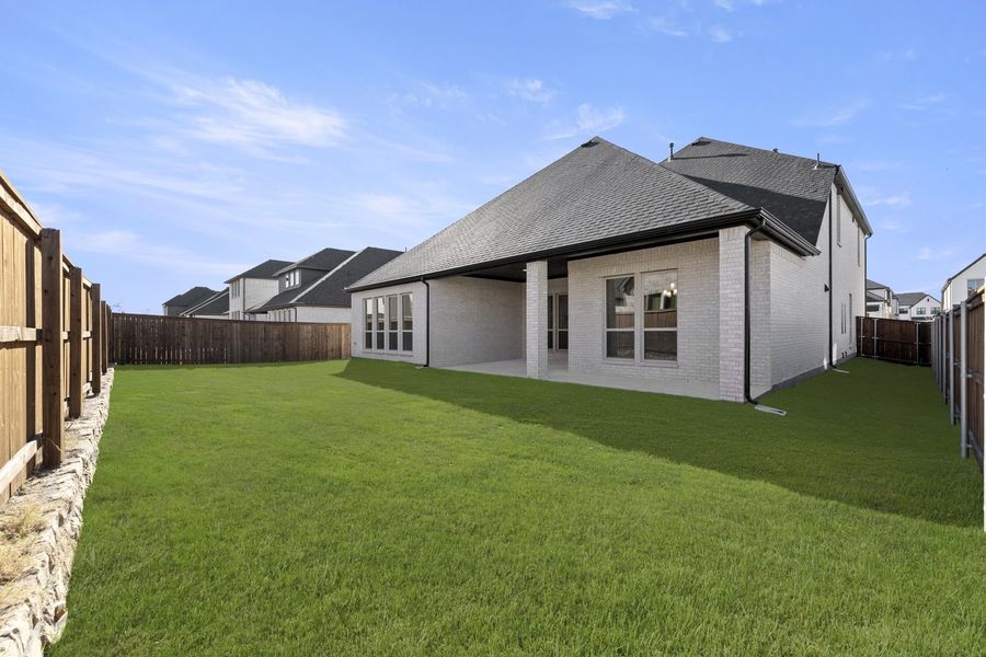 Exterior details and patio area of a home in Estates at Rockhill, Frisco (Image 23). Exterior details and patio area of a home in Estates at Rockhill, Frisco (Image 23).