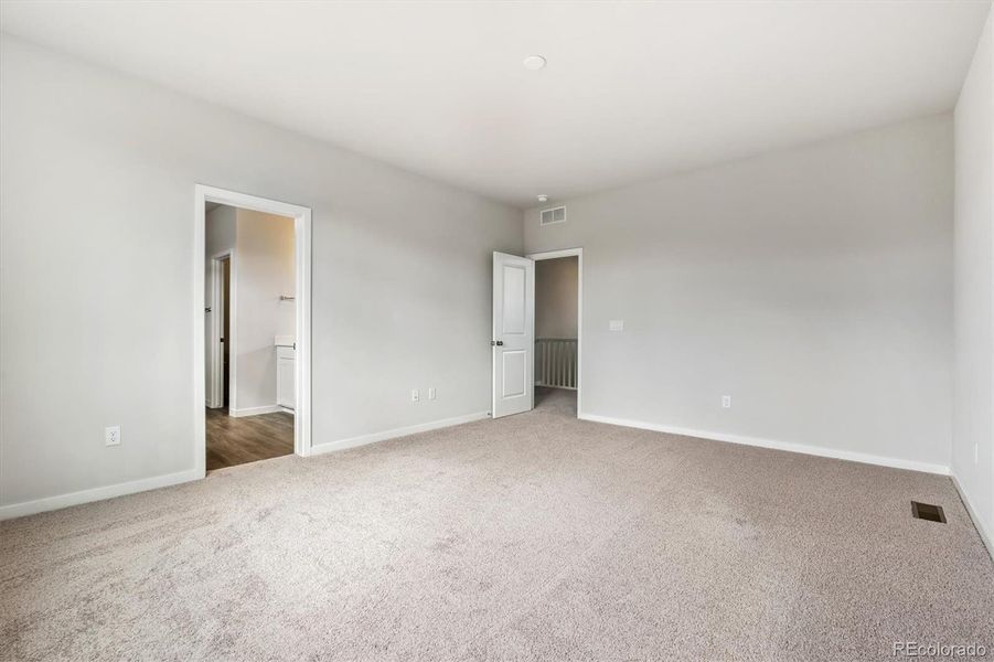 Spacious, unfurnished interior of a new home in Floret Collection at Parkdale Commons, Lafayette (Image 21).