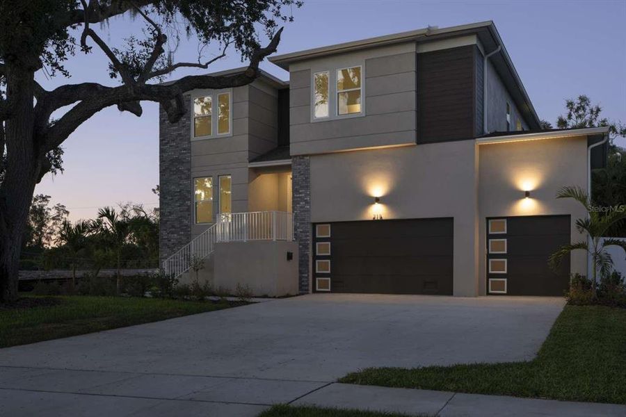 Front exterior of a new home in , St. Petersburg, FL, highlighting curb appeal (Image 1). Front exterior of a new home in , St. Petersburg, FL, highlighting curb appeal (Image 1).