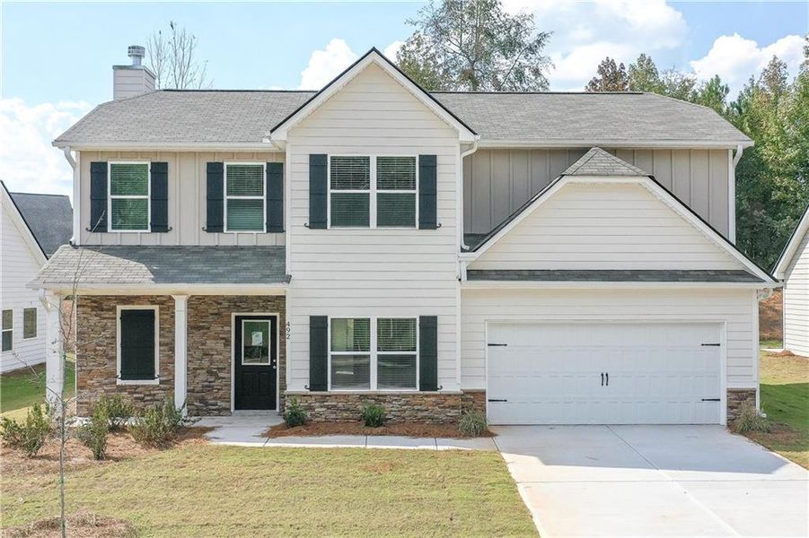 Front exterior of a new home in , Villa Rica, GA, highlighting curb appeal (Image 2).