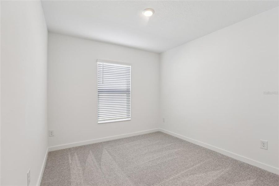 Spacious, unfurnished interior of a new home in Trilby Crossing, Brooksville (Image 8).