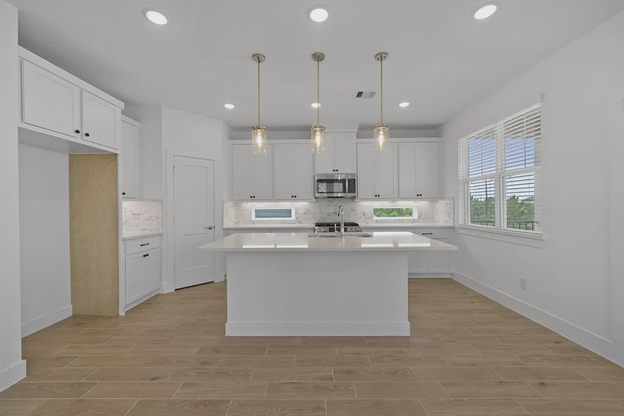 Furnished interior view inside a new home in Elyson Courtyard Collection, Katy (Image 7).