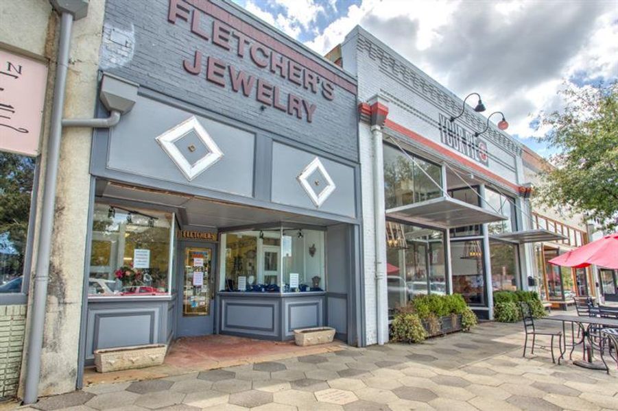 Front exterior of a new home in Pinegate, Covington, GA, highlighting curb appeal (Image 28).