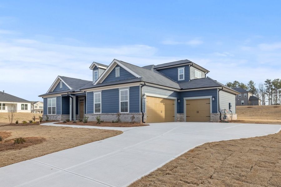 A house with a driveway. A house with a driveway.