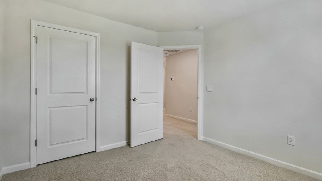 Spacious, unfurnished interior of a new home in The Townes at Honeycutt Oaks, Angier (Image 24).