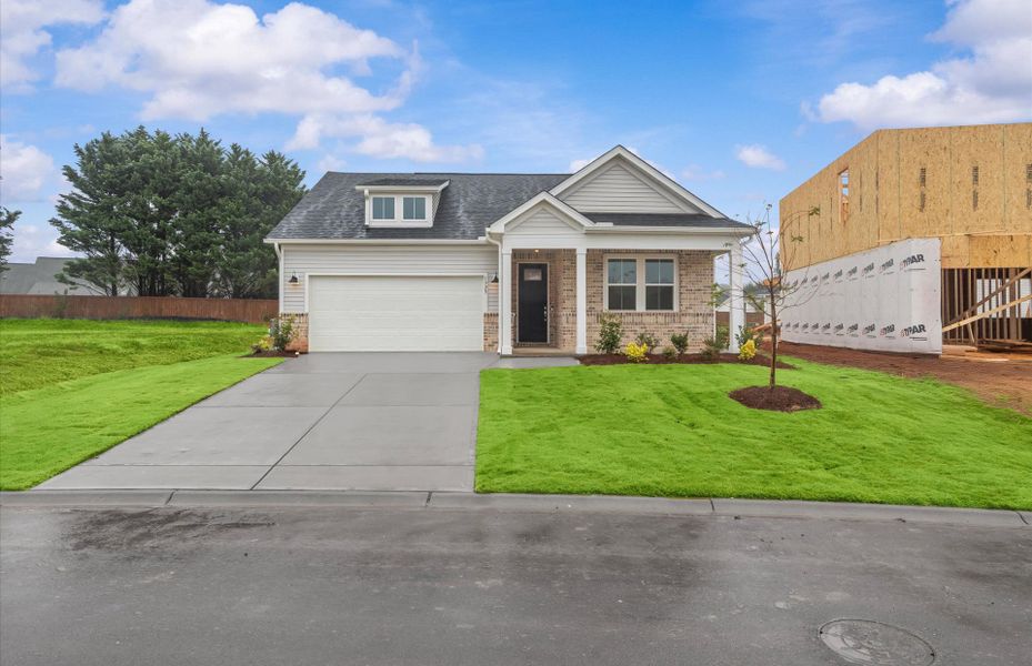 Front exterior of a new home in Fox Hollow, Spartanburg, SC, highlighting curb appeal (Image 22). Front exterior of a new home in Fox Hollow, Spartanburg, SC, highlighting curb appeal (Image 22).