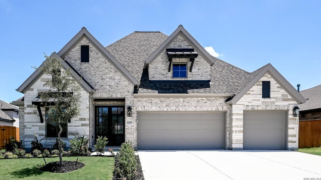 Front exterior of a new home in Veramendi, New Braunfels, TX, highlighting curb appeal (Image 21).