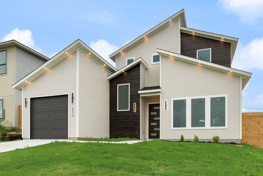 Front exterior of a new home in , Dallas, TX, highlighting curb appeal (Image 20).