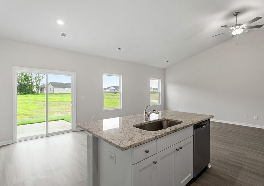 Windows let in lots of natural light to the living area