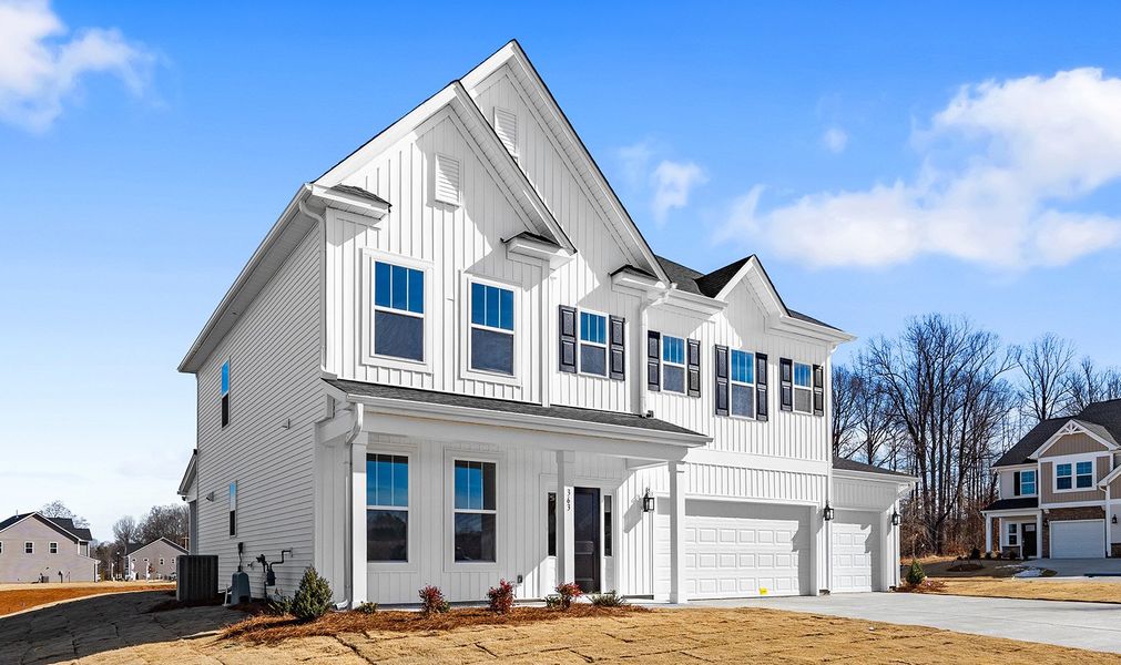 Front exterior of a new home in Fieldstone, Lexington, NC, highlighting curb appeal (Image 24).
