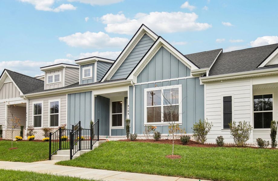 Front exterior of a new home in Stewart's Glen | 55+ Community, Smyrna, TN, highlighting curb appeal (Image 2). Front exterior of a new home in Stewart's Glen | 55+ Community, Smyrna, TN, highlighting curb appeal (Image 2).