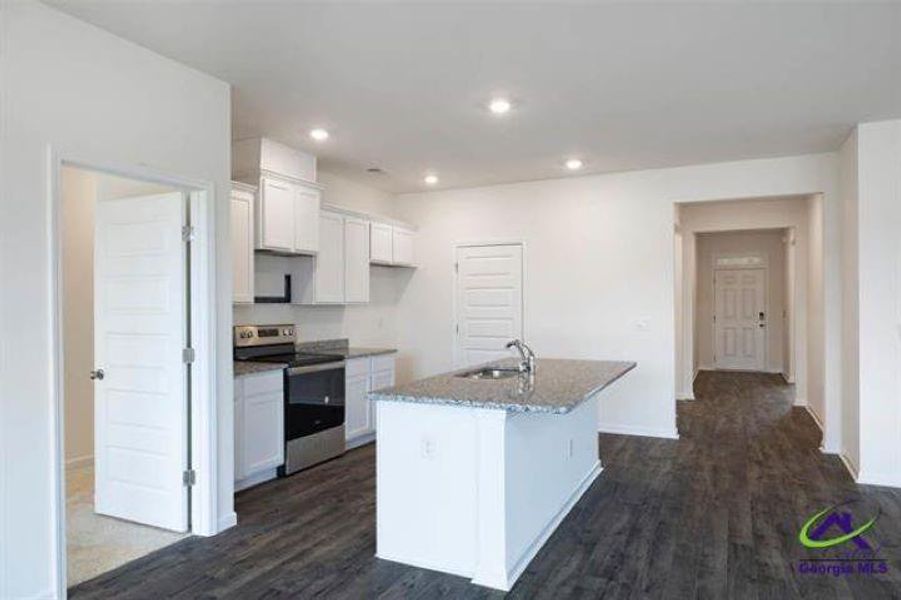 Furnished interior view inside a new home in The Preserve at Agricultural Village, Perry (Image 3). Furnished interior view inside a new home in The Preserve at Agricultural Village, Perry (Image 3).