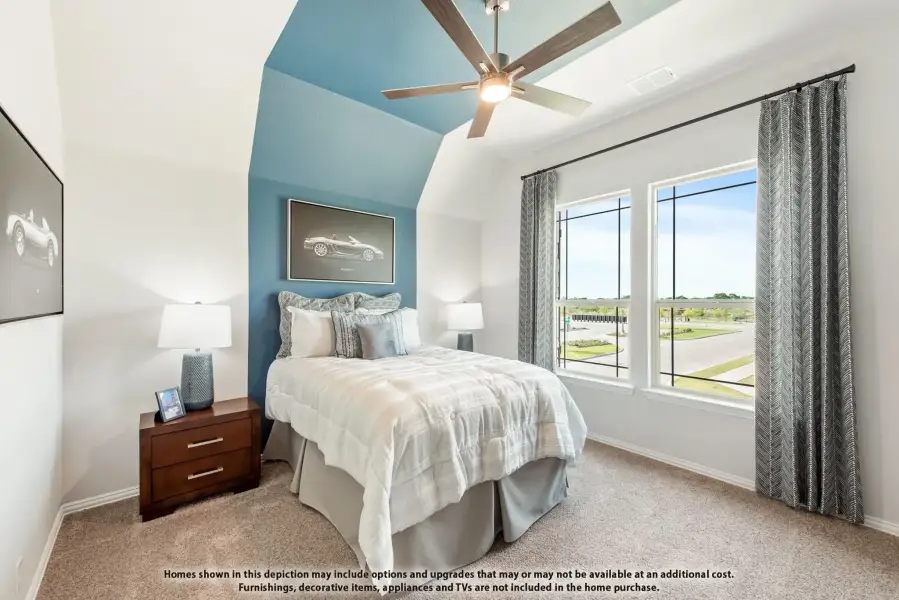Bedroom with blue arched accent wall, ceiling fan, carpet, and large windows with outdoor views