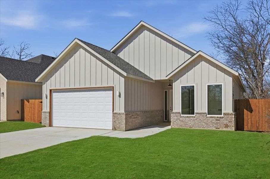 Front exterior of a new home in , Fort Worth, TX, highlighting curb appeal (Image 18). Front exterior of a new home in , Fort Worth, TX, highlighting curb appeal (Image 18).