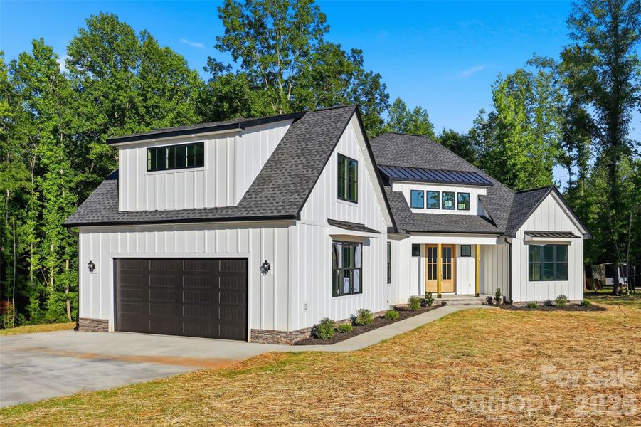 Front exterior of a new home in , Clover, SC, highlighting curb appeal (Image 25). Front exterior of a new home in , Clover, SC, highlighting curb appeal (Image 25).