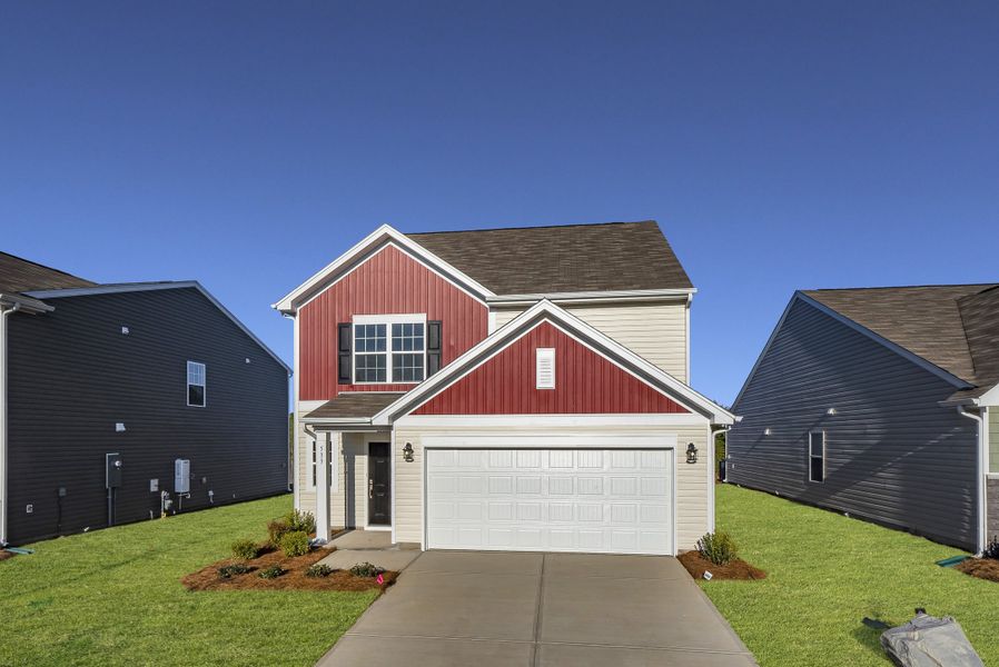 Front exterior of a new home in Heron Pointe, Gaston, SC, highlighting curb appeal (Image 1).