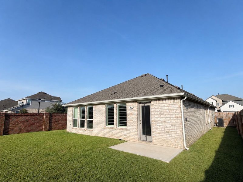 Exterior details and patio area of a home in , Katy (Image 26).