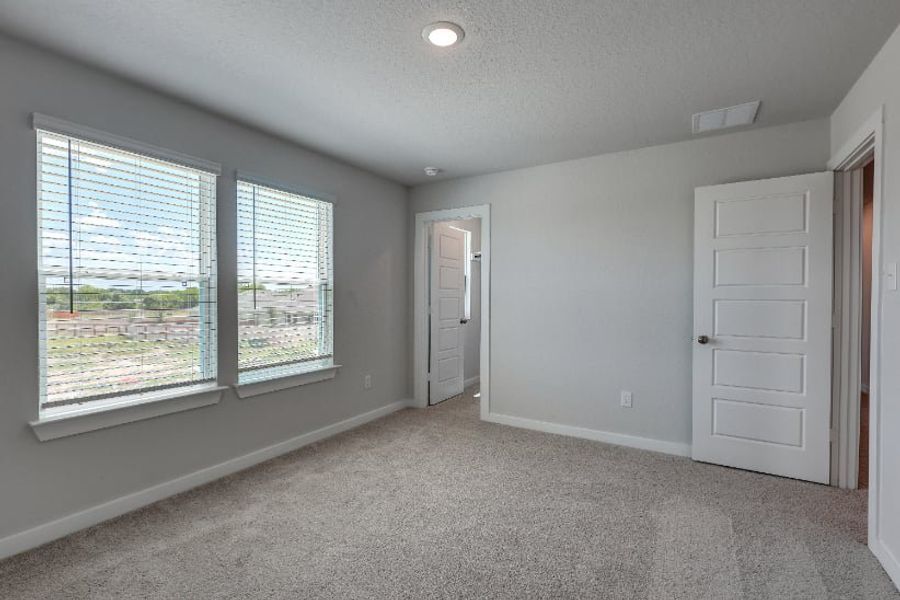 A room with a window and a door. A room with a window and a door.