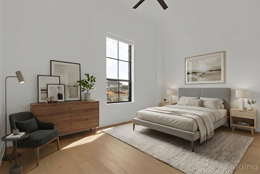 Virtually-Staged Bedroom #3 with light hardwood flooring, ceiling fan, and vaulted ceiling