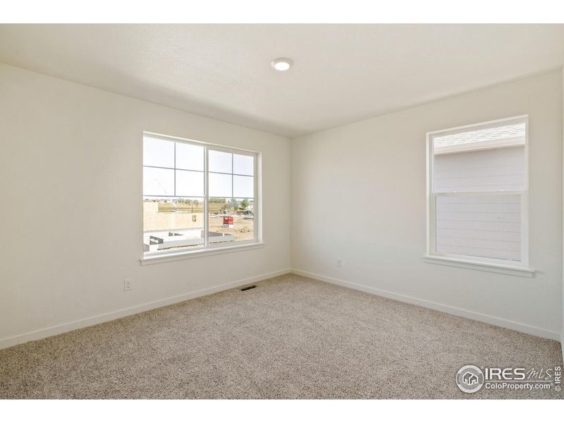Spacious, unfurnished interior of a new home in Westgate, Greeley (Image 16).
