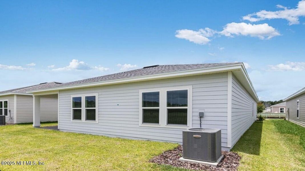 Exterior details and patio area of a home in Coopers Meadow, Jacksonville (Image 2). Exterior details and patio area of a home in Coopers Meadow, Jacksonville (Image 2).