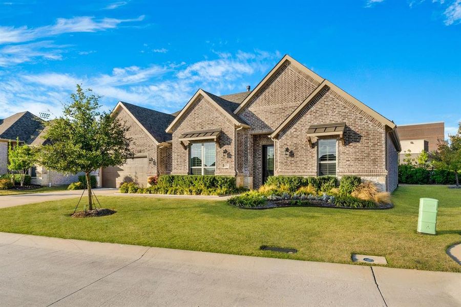 Front exterior of a new home in Ladera Prosper, Prosper, TX, highlighting curb appeal (Image 2).