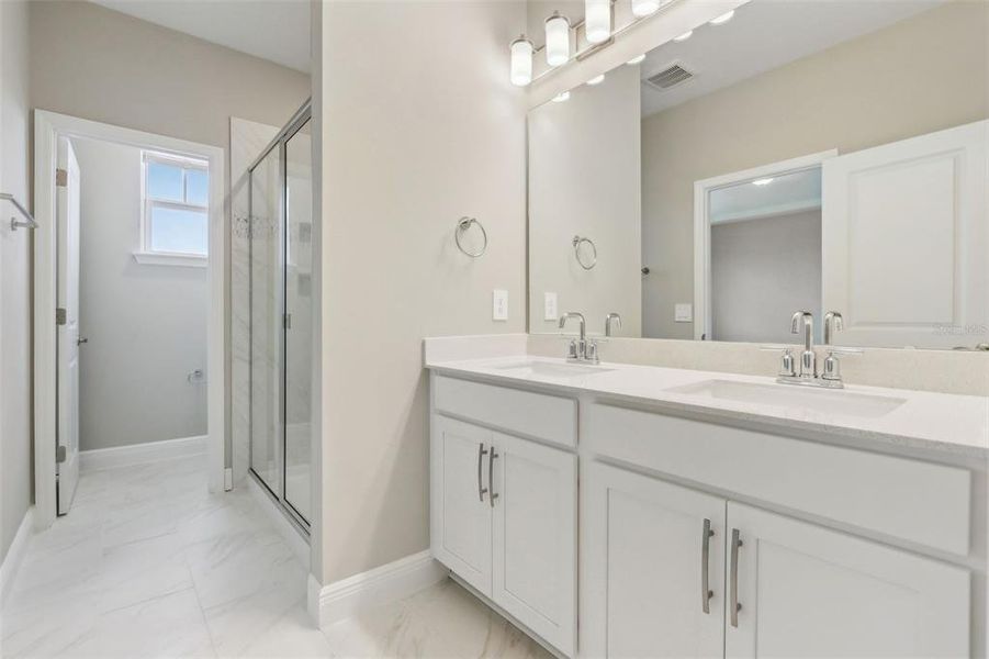 Furnished interior view inside a new home in Silverleaf Reserve Bungalows, Winter Garden (Image 8).