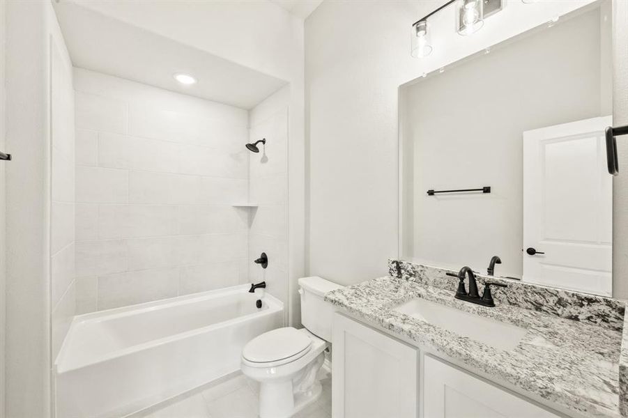 Furnished interior view inside a new home in The Retreat at North Grove 60, Waxahachie (Image 16).