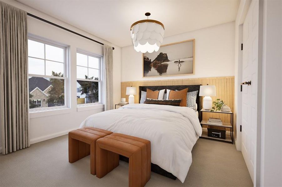 Carpeted bedroom with baseboards