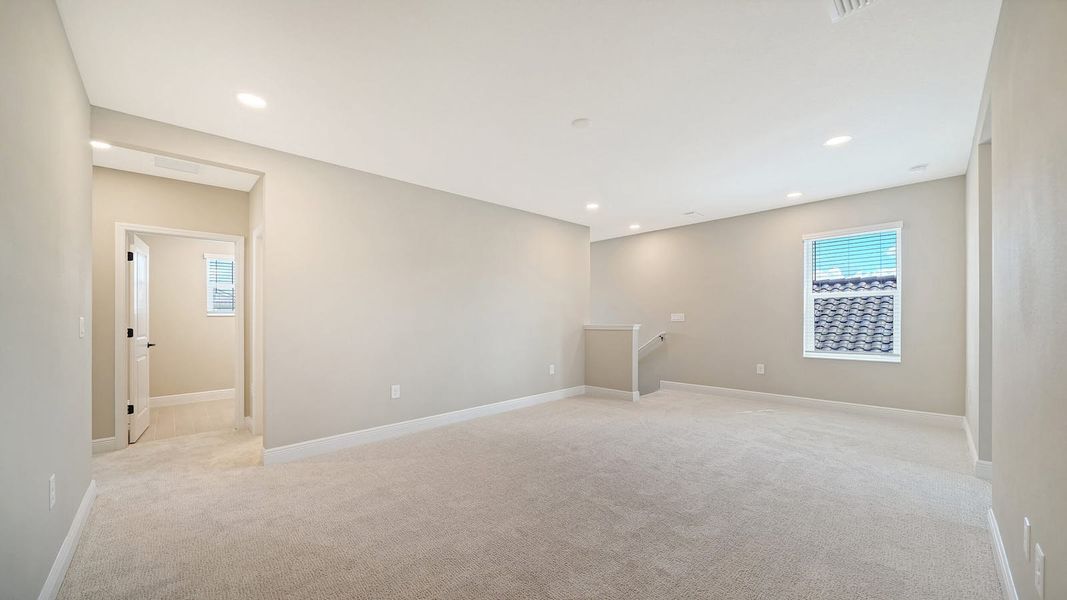 Spacious, unfurnished interior of a new home in Windward Real Estate and Homes for Sale in Sarasota, FL - Neal Communities, Lakewood Ranch (Image 40).