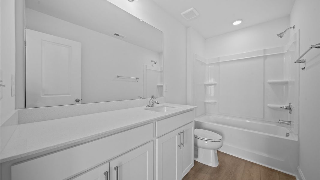 Representative furnished interior of a home built from the Freesia by DRB Homes in Essex Village, Franklinton (Image 39).