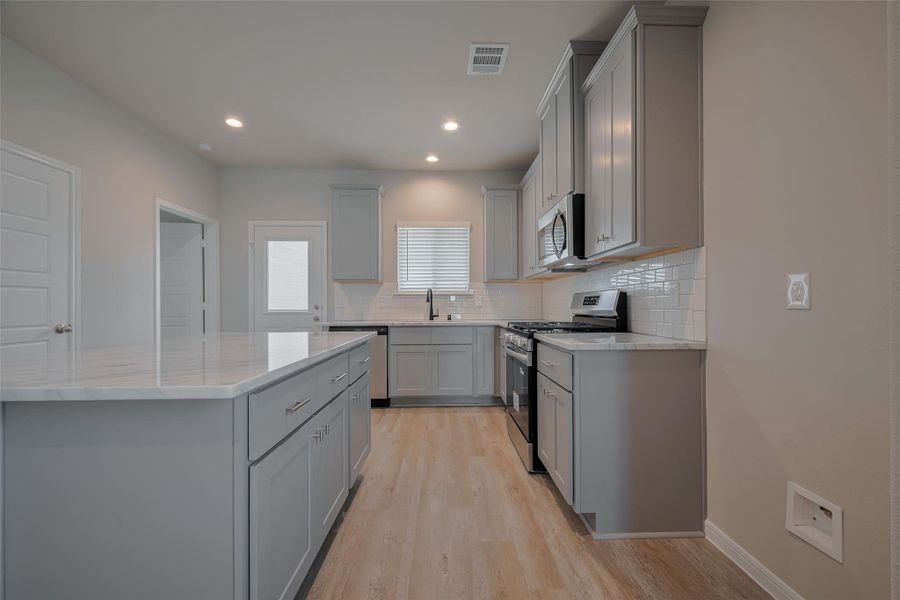 Furnished interior view inside a new home in La Segarra, Brookshire (Image 29). Furnished interior view inside a new home in La Segarra, Brookshire (Image 29).