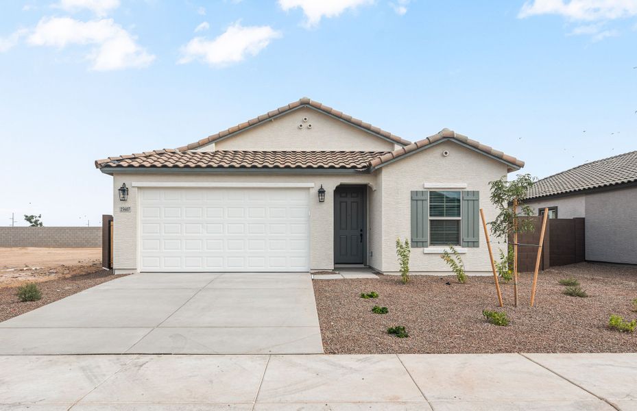 Front exterior of a new home in Hayden Estates, Buckeye, AZ, highlighting curb appeal (Image 1). Front exterior of a new home in Hayden Estates, Buckeye, AZ, highlighting curb appeal (Image 1).