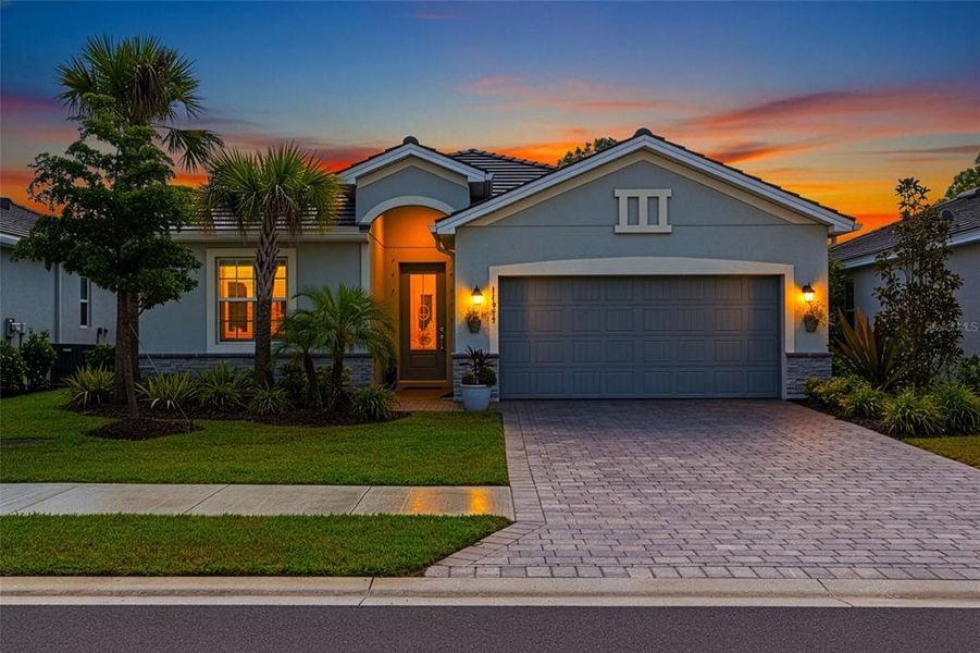 Front exterior of a new home in , Venice, FL, highlighting curb appeal (Image 1). Front exterior of a new home in , Venice, FL, highlighting curb appeal (Image 1).