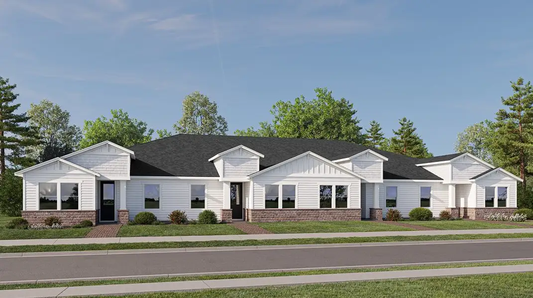 Front exterior of a new home in Sanctuary at Wellness Ridge, Clermont, FL, highlighting curb appeal (Image 1). Front exterior of a new home in Sanctuary at Wellness Ridge, Clermont, FL, highlighting curb appeal (Image 1).