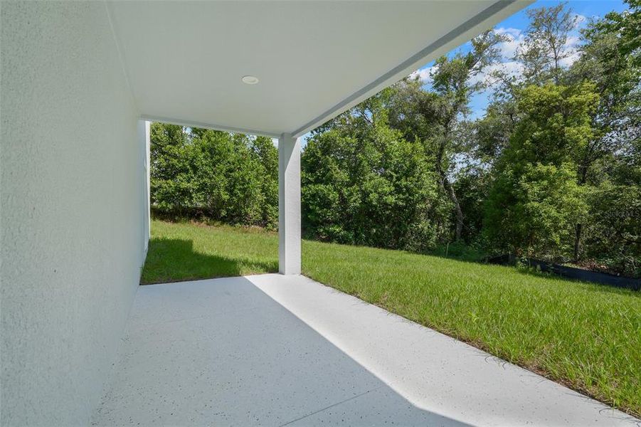 Exterior details and patio area of a home in , Deltona (Image 25).