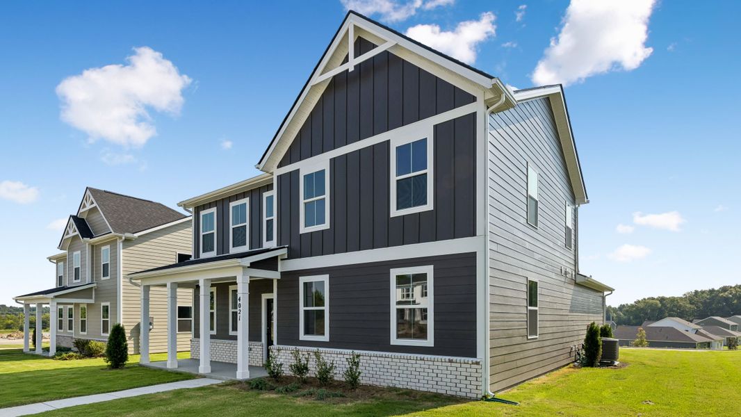 Front exterior of a new home in Reserve at Hickory Ridge, Columbia, TN, highlighting curb appeal (Image 28). Front exterior of a new home in Reserve at Hickory Ridge, Columbia, TN, highlighting curb appeal (Image 28).