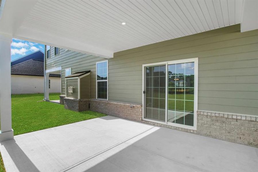 Exterior details and patio area of a home in Edinburgh, Locust Grove (Image 3).