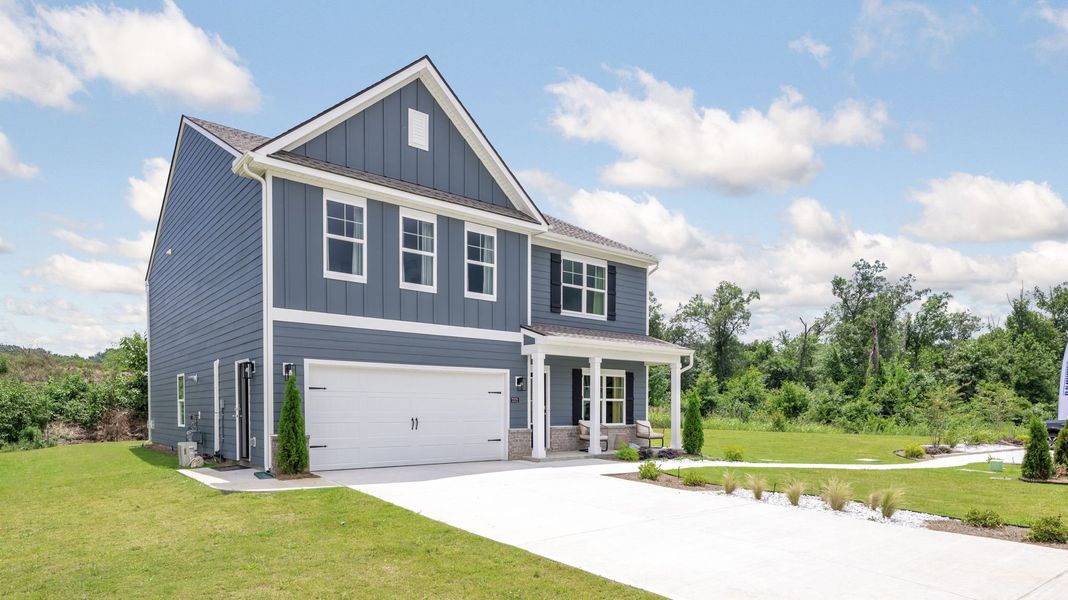 Front exterior of a new home in The Cove at Thrasher Landing, Hixson, TN, highlighting curb appeal (Image 2).
