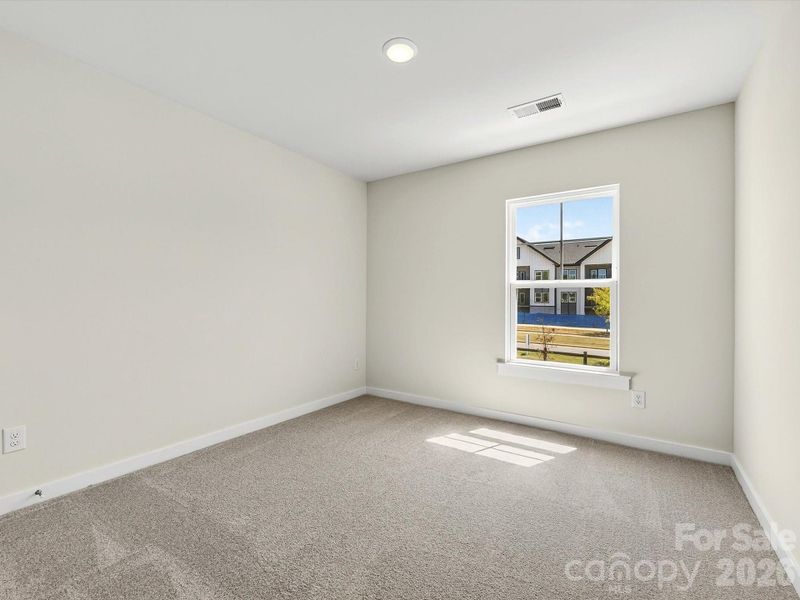 Spacious, unfurnished interior of a new home in North Creek Village - Townhomes, Huntersville (Image 19).