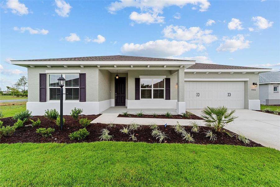 Front exterior of a new home in On Top of the World Communities, Ocala, FL, highlighting curb appeal (Image 18). Front exterior of a new home in On Top of the World Communities, Ocala, FL, highlighting curb appeal (Image 18).