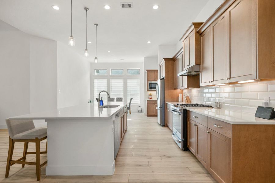 Your family and guests will enjoy many nights of fun, food and entertainment with ample counter space and kitchen island for setting up a wonderful array of provisions! Your family and guests will enjoy many nights of fun, food and entertainment with ample counter space and kitchen island for setting up a wonderful array of provisions!