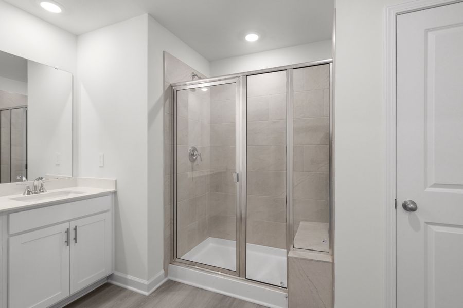 Furnished interior view inside a new home in Waterside - Boardwalk Series, Longs (Image 11).