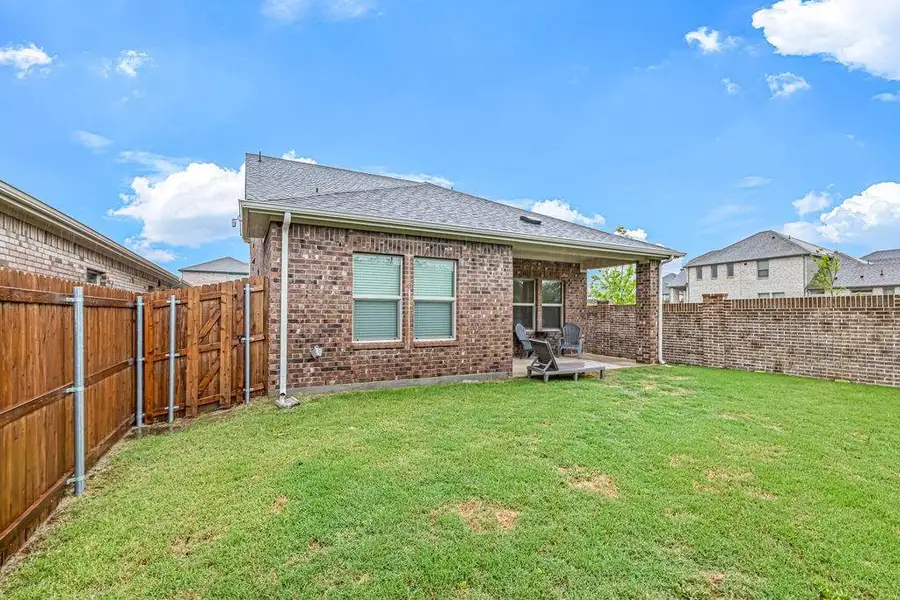 Exterior details and patio area of a home in , McKinney (Image 4).