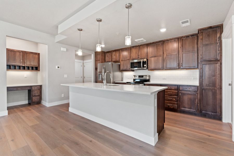 Representative furnished interior of a home built from the The Cambridge 2 by Landmark Homes in The Lakes at Centerra, Loveland (Image 5).